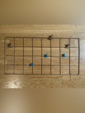 Metal Grid Photo Display with Blue and Gold Clips